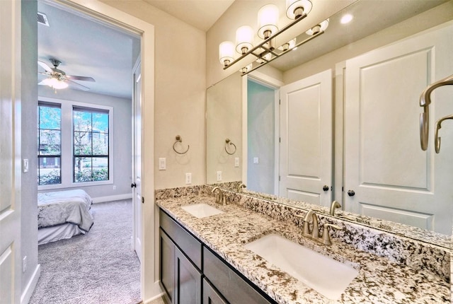 12113 Beautybrush Dr, Austin, TX 78738 - ensuite bathroom with double vanity and a ceiling fan