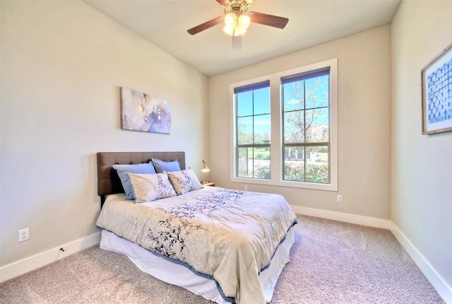 12113 Beautybrush Dr, Austin, TX 78738 - carpeted bedroom with baseboards and ceiling fan