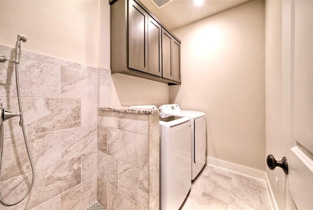 12113 Beautybrush Dr, Austin, TX 78738 - laundry area with separate washer and dryer and cabinet space