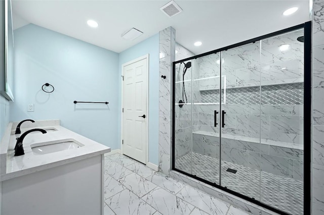 bathroom featuring recessed lighting, visible vents, a sink, and marble finish floor