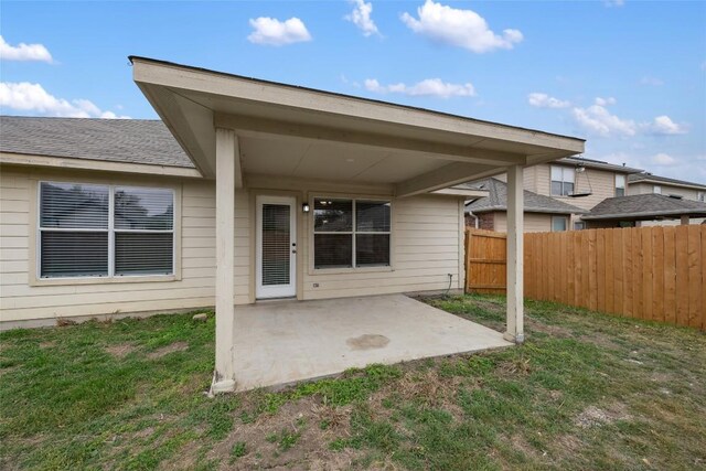 4009 Veiled Falls Dr, Pflugerville, TX 78660 - rear view of house with a yard, fence, and a patio