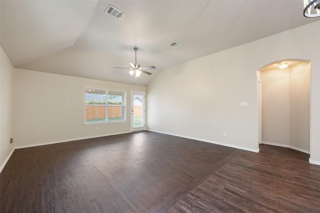 4009 Veiled Falls Dr, Pflugerville, TX 78660 - empty room with arched walkways, ceiling fan, lofted ceiling, and dark wood-style flooring