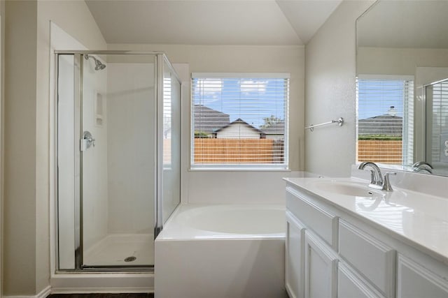 4009 Veiled Falls Dr, Pflugerville, TX 78660 - full bathroom featuring a shower stall, vanity, a bath, and vaulted ceiling