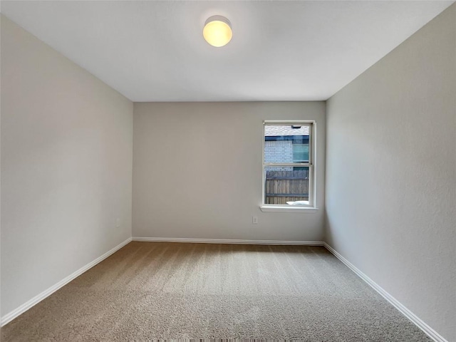 137 Periwinkle Ln, Bastrop, TX 78602 - empty room with carpet and baseboards
