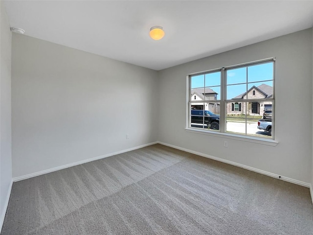 137 Periwinkle Ln, Bastrop, TX 78602 - unfurnished room with carpet floors and a smoke detector
