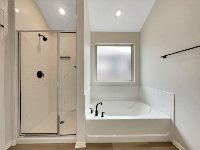 137 Periwinkle Ln, Bastrop, TX 78602 - bathroom with a bath and a stall shower