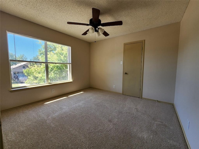 2516 Glen Field Dr, Cedar Park, TX 78613 - unfurnished room with carpet flooring, a textured ceiling, and ceiling fan