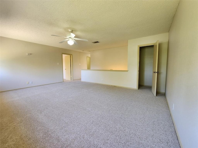 2516 Glen Field Dr, Cedar Park, TX 78613 - spare room featuring light colored carpet, a ceiling fan, and a textured ceiling