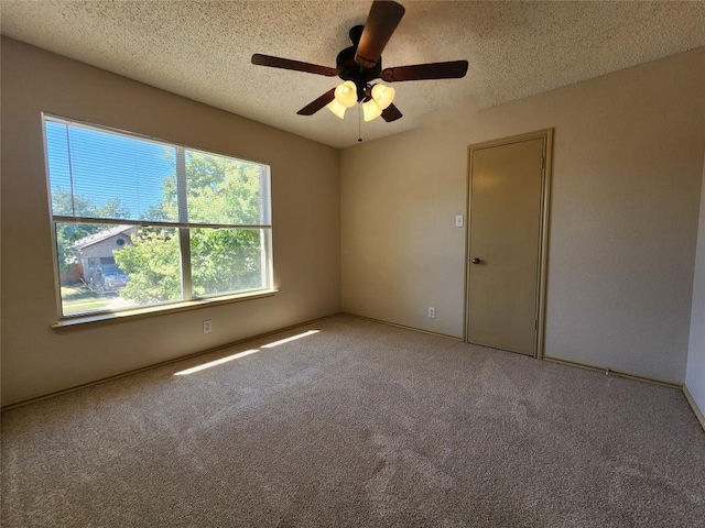 2516 Glen Field Dr, Cedar Park, TX 78613 - carpeted empty room featuring a textured ceiling and ceiling fan