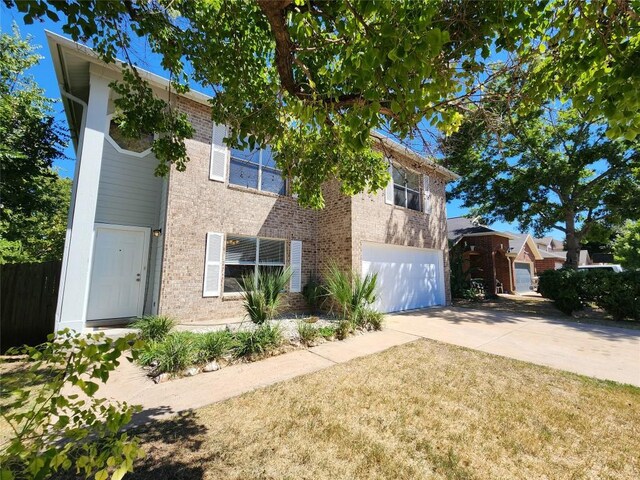 2516 Glen Field Dr, Cedar Park, TX 78613 - view of front of house featuring brick siding, driveway, and an attached garage