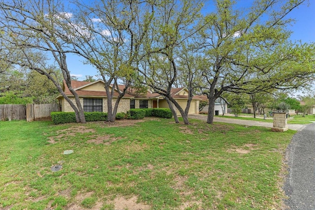 1306 Daytona Dr, Austin, TX 78733 - view of front of house featuring a garage and driveway