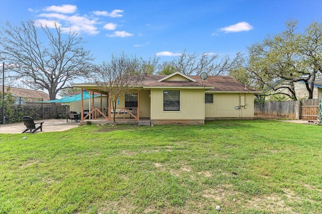 1306 Daytona Dr, Austin, TX 78733 - back of property with a patio area and a fenced backyard