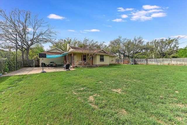 1306 Daytona Dr, Austin, TX 78733 - fenced backyard with a patio area