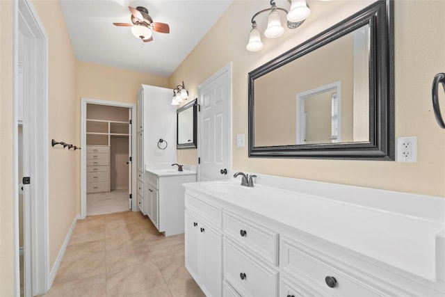 330 Arbors Cir, Elgin, TX 78621 - full bathroom with vanity, a walk in closet, and tile patterned flooring