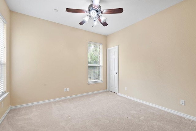 330 Arbors Cir, Elgin, TX 78621 - unfurnished room featuring light carpet, baseboards, and a ceiling fan