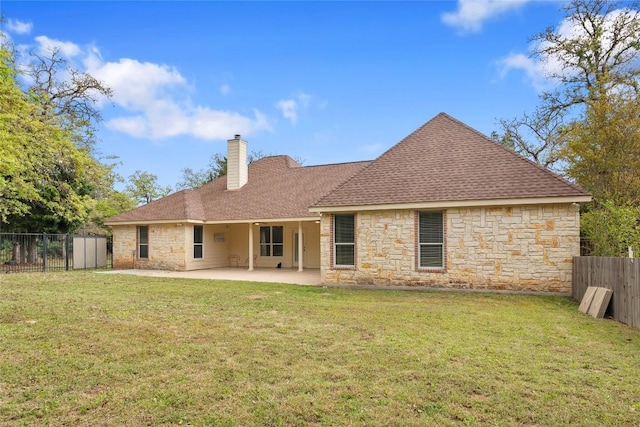 330 Arbors Cir, Elgin, TX 78621 - rear view of house featuring stone siding, a chimney, a patio area, and a shingled roof