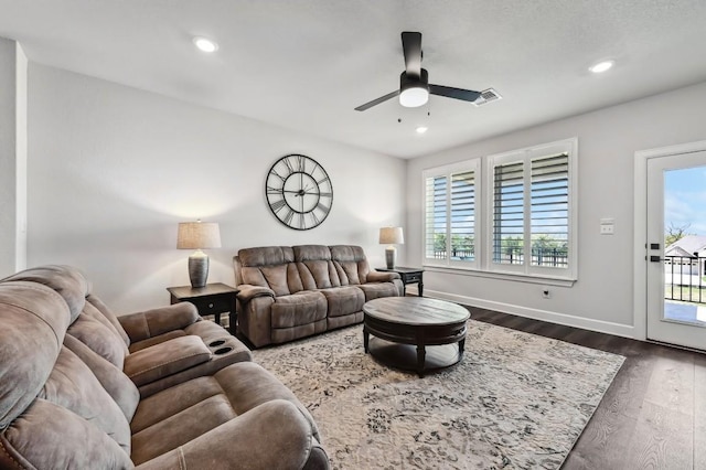 113 Cibolo Creek Loop, Bastrop, TX 78602 - living room with healthy amount of natural light, a ceiling fan, dark wood-style flooring, and recessed lighting