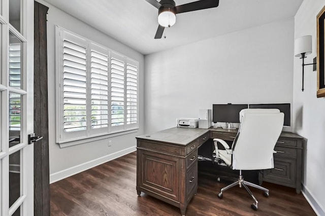 office with baseboards, dark wood-style floors, and ceiling fan