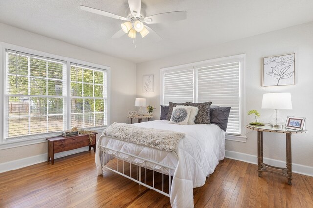 904 Fisher St, Taylor, TX 76574 - bedroom with hardwood / wood-style flooring and ceiling fan