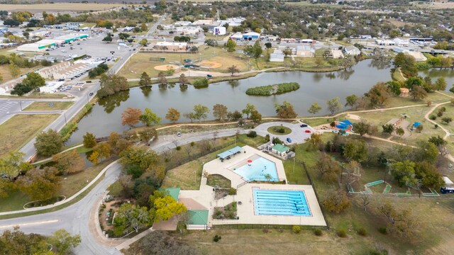 904 Fisher St, Taylor, TX 76574 - aerial overview of property's location featuring a nearby body of water and a pool area