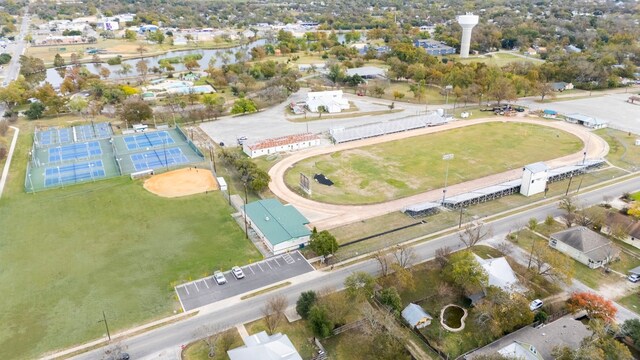 904 Fisher St, Taylor, TX 76574 - aerial view of property and surrounding area featuring a large body of water