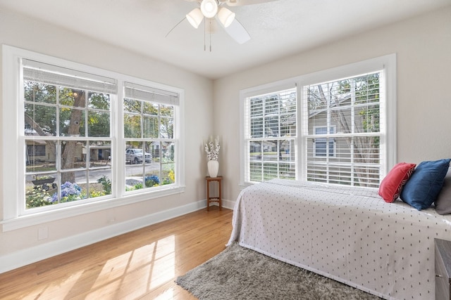 904 Fisher St, Taylor, TX 76574 - bedroom featuring light wood finished floors and a ceiling fan