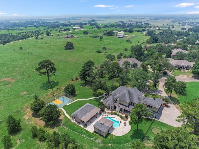 106 Elm Ct, Bastrop, TX 78602 - aerial view of property and surrounding area featuring a pool area and rural landscape