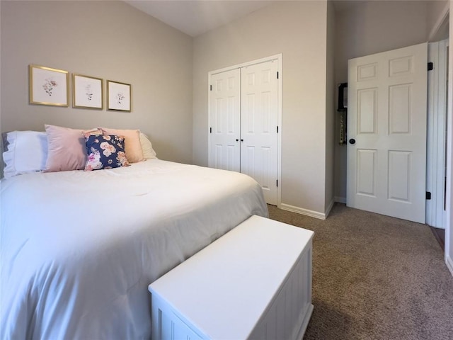 bedroom featuring a closet, baseboards, and dark carpet