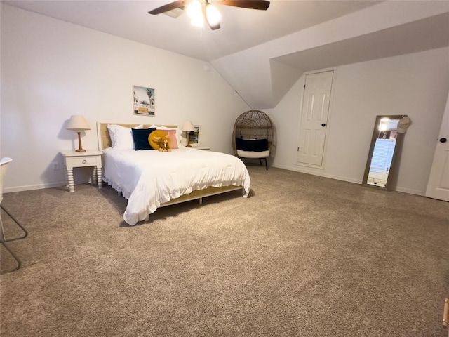 bedroom with baseboards, vaulted ceiling, and a ceiling fan