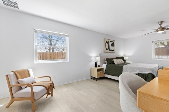6809 Lunar Dr, Austin, TX 78745 - bedroom featuring light wood-style floors and baseboards