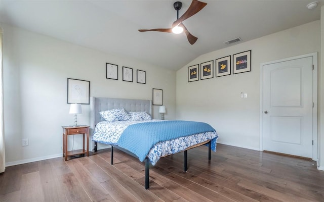 20700 Deep Crk, Lago Vista, TX 78645 - bedroom featuring wood finished floors, lofted ceiling, baseboards, and ceiling fan