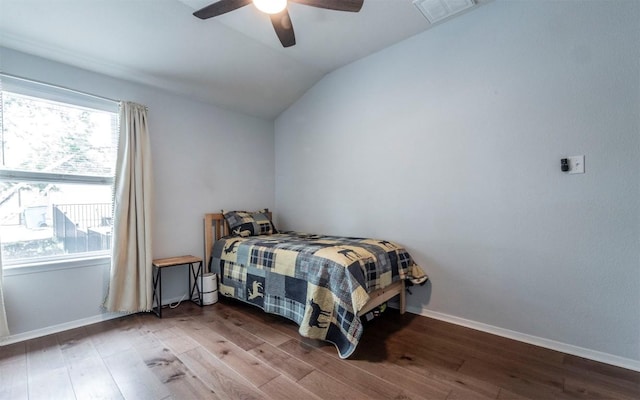 20700 Deep Crk, Lago Vista, TX 78645 - bedroom with vaulted ceiling, wood finished floors, ceiling fan, and baseboards