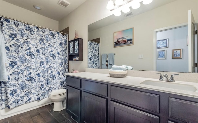 20700 Deep Crk, Lago Vista, TX 78645 - bathroom featuring toilet, vanity, and wood finished floors