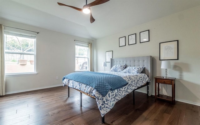 20700 Deep Crk, Lago Vista, TX 78645 - bedroom with lofted ceiling, wood finished floors, baseboards, and a ceiling fan