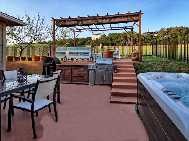 20700 Deep Crk, Lago Vista, TX 78645 - fenced backyard with a jacuzzi, outdoor dining space, an outdoor kitchen, a pergola, and a patio area