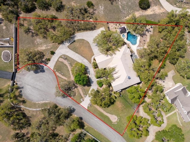 290 Trailmaster Cir, Driftwood, TX 78619 - aerial view of property's location with property parcel outlined and a pool