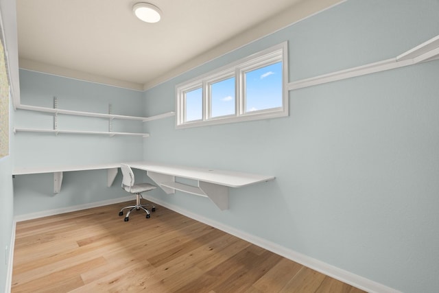 4004 Cloudy Ridge Rd, Austin, TX 78734 - unfurnished office with built in desk and wood finished floors