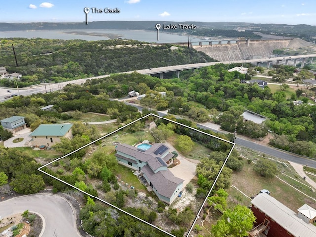 4004 Cloudy Ridge Rd, Austin, TX 78734 - aerial view of property and surrounding area with property boundaries highlighted and a nearby body of water