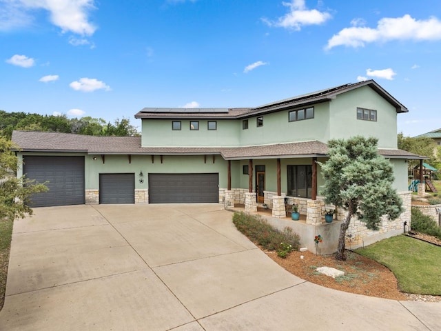 4004 Cloudy Ridge Rd, Austin, TX 78734 - view of front of property with a porch, stone siding, stucco siding, and driveway