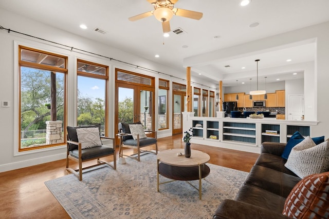 4004 Cloudy Ridge Rd, Austin, TX 78734 - living room with baseboards, recessed lighting, a ceiling fan, concrete flooring, and french doors