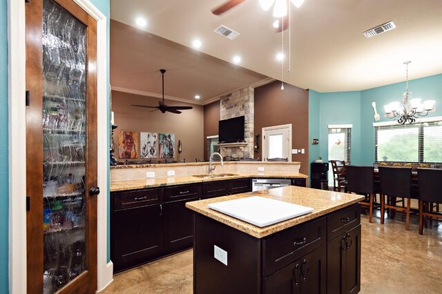 2129 Woodland Bend Rd, Salado, TX 76571 - kitchen with visible vents, a sink, stainless steel dishwasher, and ceiling fan with notable chandelier