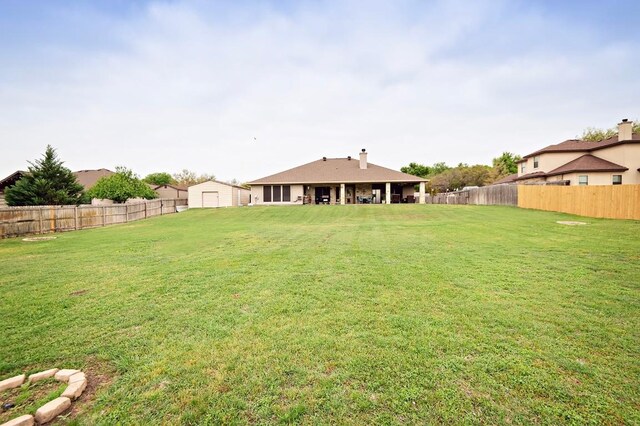 2129 Woodland Bend Rd, Salado, TX 76571 - view of yard featuring a fenced backyard and an outdoor structure