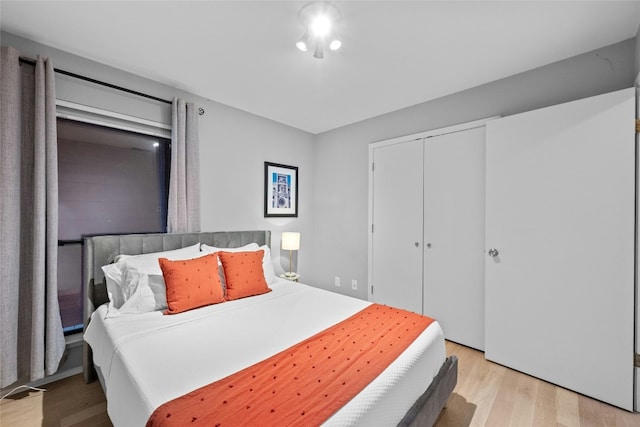 1406 Windsor Rd Unit 301, Austin, TX 78703 - bedroom with a closet and light wood finished floors