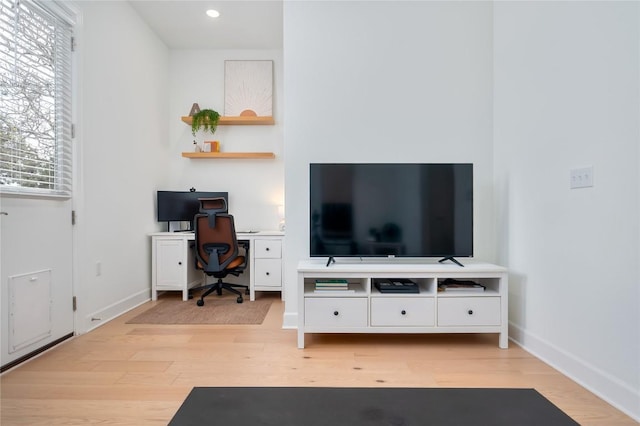 office area with baseboards, light wood-type flooring, and recessed lighting