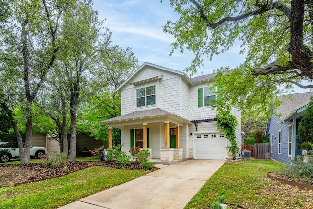 6108 Whipple Way, Austin, TX 78745 - view of front of home with a porch, an attached garage, and driveway