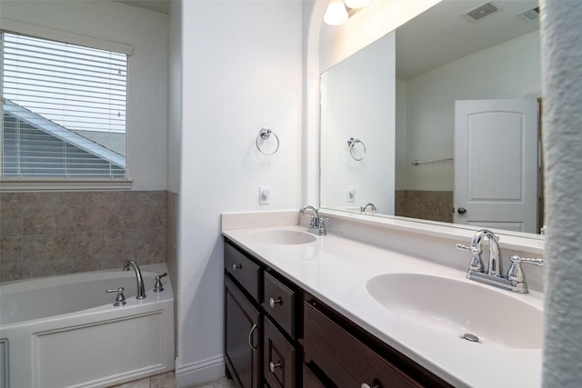 6108 Whipple Way, Austin, TX 78745 - bathroom with double vanity and a bath