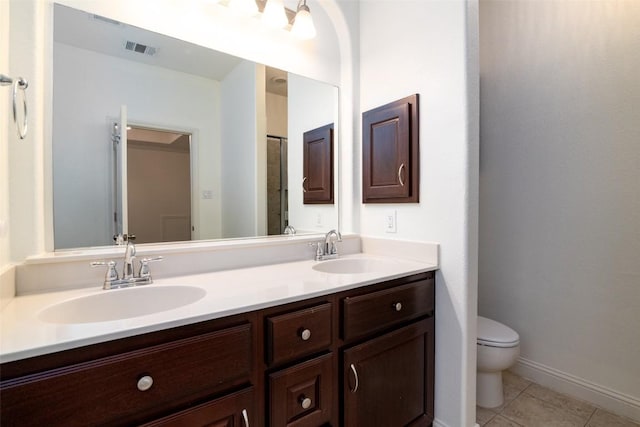 6108 Whipple Way, Austin, TX 78745 - full bath with double vanity and tile patterned floors