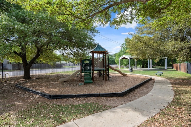 community jungle gym with fence
