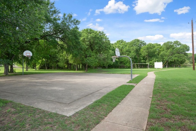 3603 Canaan Matthew Dr, Austin, TX 78725 - view of basketball court featuring community basketball court and a lawn