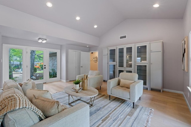 8702 Willowick Dr, Austin, TX 78759 - living area featuring light wood-type flooring, recessed lighting, and high vaulted ceiling
